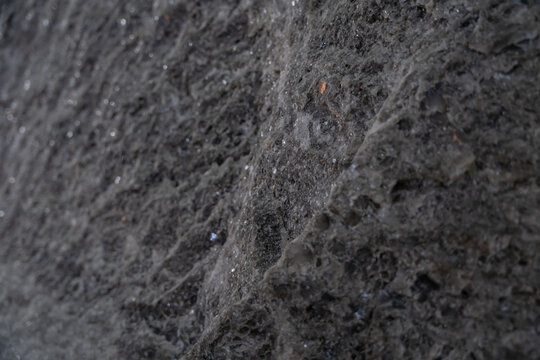 Details with the walls of a cave dug by man for the extraction of minerals. Salt from the mine observed in its natural environment. Crystals stored in the depths of the salt pan Slanic Romania