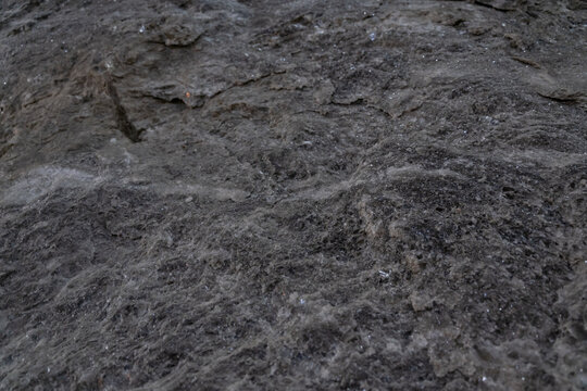 Details with the walls of a cave dug by man for the extraction of minerals. Salt from the mine observed in its natural environment. Crystals stored in the depths of the salt pan Slanic Romania