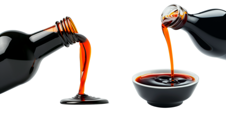 Dark soy sauce poured from bottle isolated on white transparent background.