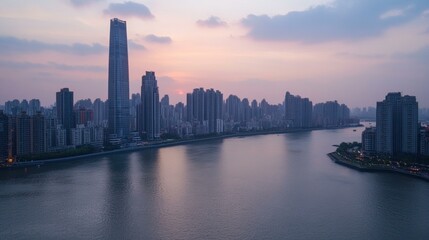 Fototapeta premium Expansive city skyline view from a bridge at sunset with vibrant skies and urban architecture.