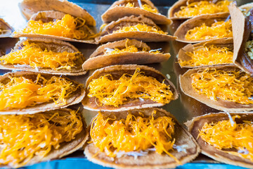 Golden Thai Crispy Pancakes Filled with Sweet Coconut Cream and Egg Yolk