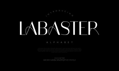 Fototapeta premium Labaster typography beauty fashion elegant minimalist serif italic fonts decorative wedding vintage retro logos. Minimal luxury font alphabet logo. Vector illustration