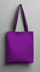 A sleek purple tote bag mockup showcased against a smooth gray backdrop for product presentation