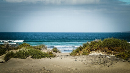 Beach and Atlantic Ocean in Caleta de Famara, Lanzarote Canary Islands.