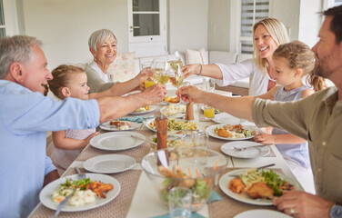Happy family, dinner and toast with wine glass in home for thanksgiving celebration. Parents, grandparents and children cheers with drinks, food or generations at social gathering on holiday together