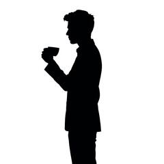 A businessman silhouette standing and drinking coffee, with one hand holding a coffee cup near his mouth