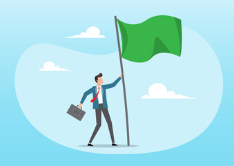 Success businessman raising winning flag with triumph and proud