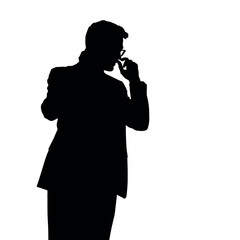 A businessman silhouette talking on a mobile phone, with one hand on his hip and a confident posture