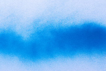 スプレー塗料で塗られた青色の背景