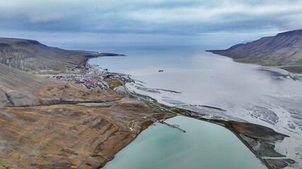 Aerial view of Longyearbyen in Svalbard showcasing the tranquil landscape and seascape