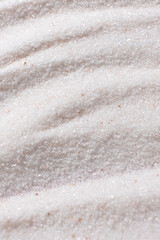 Natural Himalayan Pink Salt Fine Ground Top View Abstract Texture Vertical Background