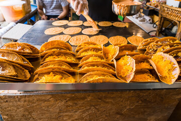 Golden Thai Crispy Pancakes Filled with Sweet Coconut Cream and Egg Yolk