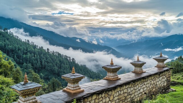 A scenic view of the Dochula Pass, with 108 chortens (stupas) against a backdrop