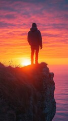 Obraz premium Cliffside Contemplation, a lone figure poised on a precipice, gazing at the vast horizon, embodying solitude and introspection.