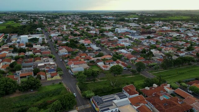 aerial panoramic view of a small city during sunset time. Dracena, a small city in the state of S&atilde;o Paulo, Brazil .