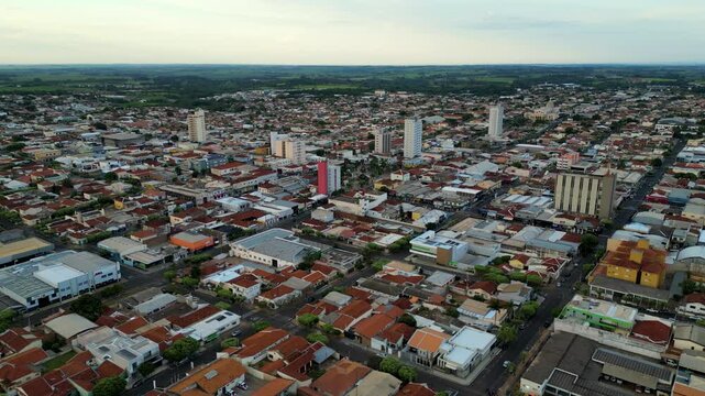 aerial dolly reverse view of house square blocs in the small and developed city of Dracena in the countryside of S&atilde;o Paulo, Brazil