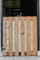 Wooden fence on the door of house