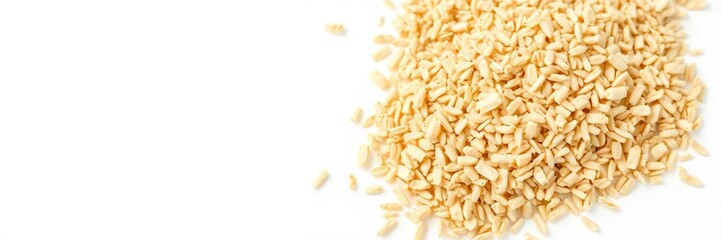 Closeup of a small handful of psyllium husk, showing the texture and natural color on a white background, dietary, fiber