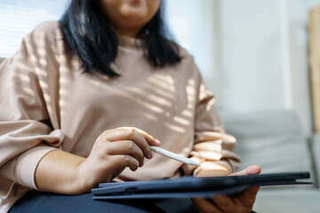 Business woman hand presses on screen digital tablet Online Digital marketing  technology.