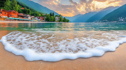 Foamy Waves On A Sandy Beach With Mountains In The Background, water, blue water, mountain range, green mountains, mountains landscape