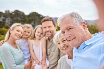 Happy, portrait and big family with selfie in nature for holiday memory, weekend or outdoor vacation. Grandparents, parents and children with smile in joy for picture, photography or moment at park