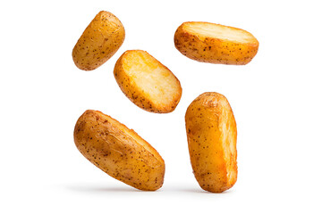 Fototapeta premium Floating roasted potatoes, isolated on white background.