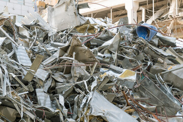The wreckage of a demolished building. A pile of construction waste on a construction site....