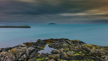 A long exposure shot of the coastline of Eriskay in the Outer Hebrides of Scotland.