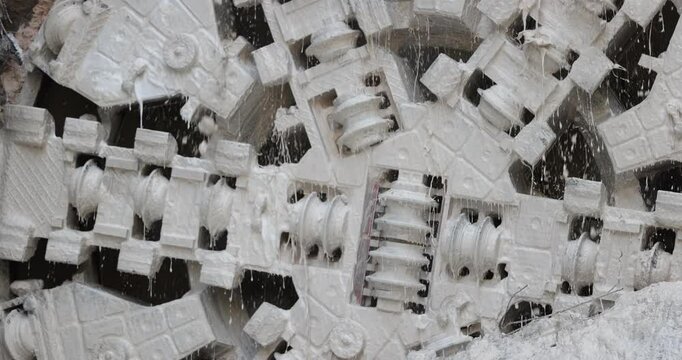 Tunnel boring machine(TBM) head on display at subway construction site ,underground infrastructure transportation