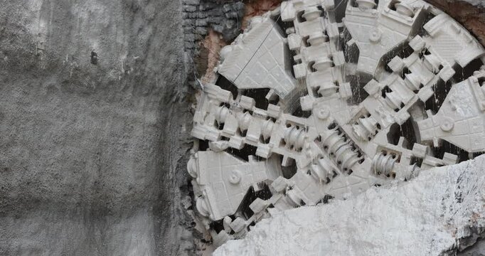 Tunnel boring machine(TBM) head on display at subway construction site ,underground infrastructure transportation