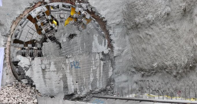 Tunnel boring machine(TBM) head on display at subway construction site ,underground infrastructure transportation