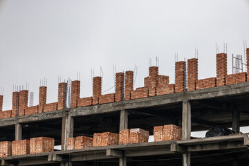The subject of the photo is the construction of a building of a business center or residential...