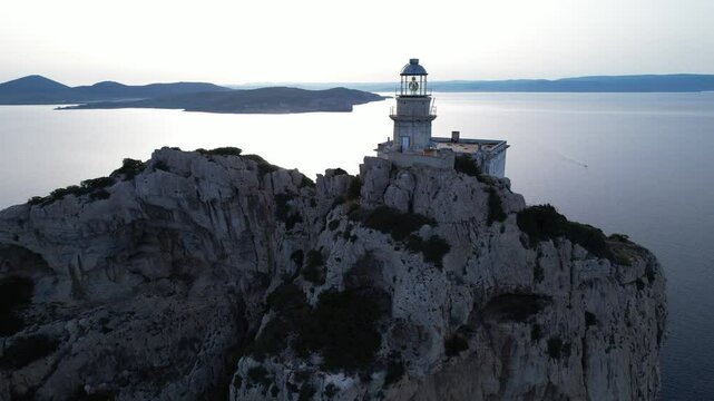  Capo Caccia's stunning lighthouse in Sardinia at sunset with breathtaking views