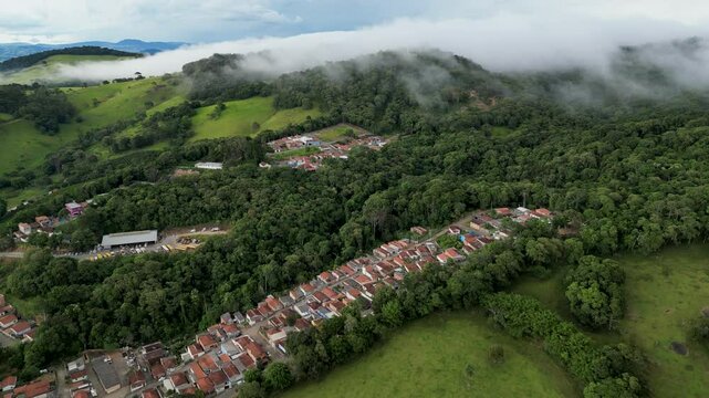 cold and fog day in a neighborhood built on a hill surrounded by the Atlantic forest - Bueno Brandao, Serra da Mantiqueira - Brazil