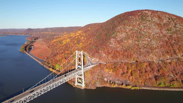 Bear Mountain Bridge and NY-9A in full autumn colors, 4K drone shot