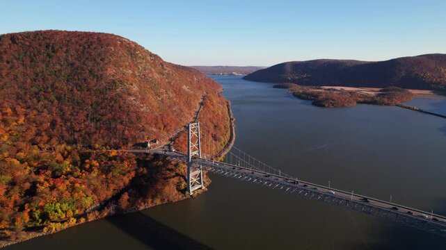 High aerial panorama of the Hudson River, New York at Bear Mountain Bridge, autumn, 4K