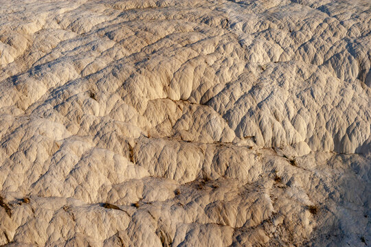 Aerial view of beautiful travertine terraces and ancient ruins of Hierapolis, Pamukkale, Denizli, Turkey.