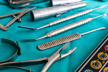 Surgical Instruments on Blue Cloth Displayed Neatly