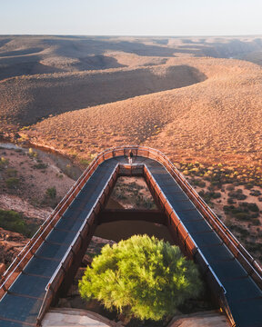 Aerial view of kalbarri skywalk over rugged desert landscape, kalbarri national park, australia.