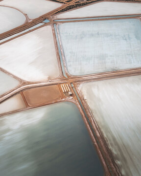 Aerial view of colorful geometric patterns in salt marshes, Useless Loop, Australia.