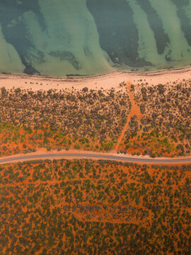 Aerial view of beautiful coastline with serene beach and remote ocean, Monkey Mia, Shark Bay, Australia.