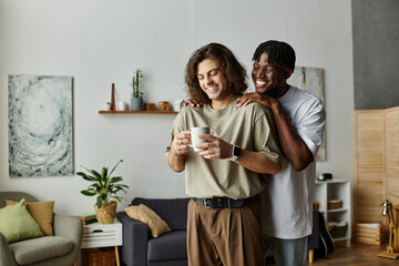 Loving partners enjoy each other while sharing warm drinks in their inviting home.