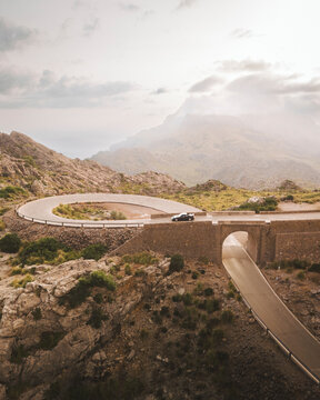 Aerial view of scenic winding mountain road through rugged landscape, Sa Calobra, Nus de Sa Corbata, Escorca, Spain.