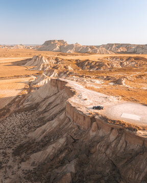 Aerial view of beautiful rock formations and canyon in the arid Bardenas Reales, Cortes, Navarre, Spain.