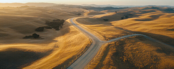 Golden hills and winding roads create serene landscape at sunset, showcasing beauty of natures curves and textures. warm light enhances rolling terrain, inviting exploration