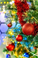 Background with blur on the theme of Christmas or New Year with toys and shining elements