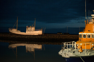 Old fishing boat resting in harbor