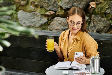 A young woman with a prosthetic leg relaxes in a cafe, sipping a drink while focusing on her phone...