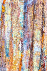 Aged faded colored grunge background with textured surface for design or background