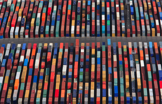 Saint Petersburg, Russia - 11 August 2006: Aerial view of colorful shipping containers stacked in an organized pattern at a bustling port, Saint Petersburg, Russia.
